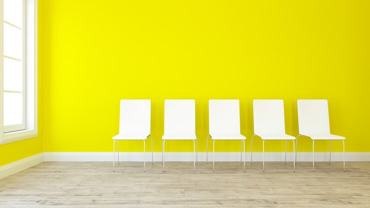 Photo gratuit rendu 3d d&#39;une rangée de chaises dans une pièce vide
