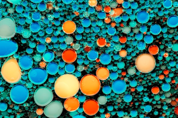 Résumé fond bulle d'huile colorée dans le papier peint de l'eau