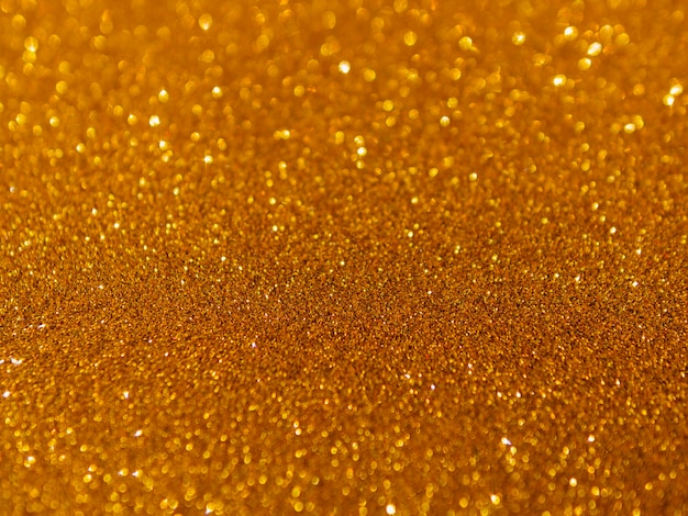 Photo gratuite résumé de fond de texture pailletée d'or