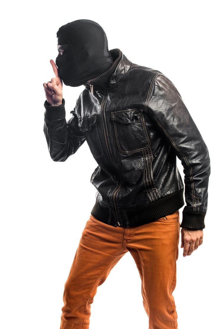 Photo gratuit robber faisant silence geste
