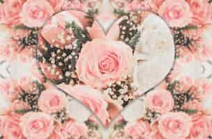 Photo gratuite roses roses avec forme de coeur