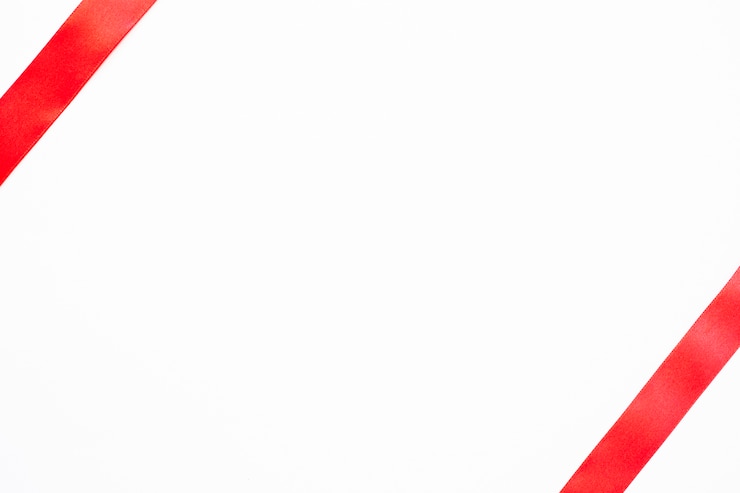 Photo gratuit un ruban rouge sur un fond blanc vide