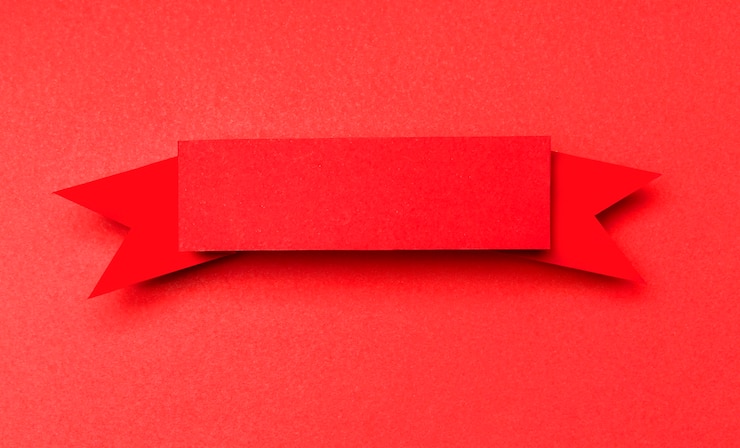 Photo gratuit un ruban rouge sur un fond rouge