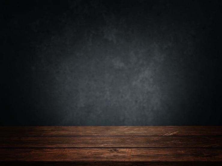 Photo gratuit salle vide avec plancher en bois et mur bleu foncé