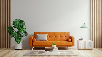 Photo gratuite le salon a un canapé en cuir orange et une décoration minimale
