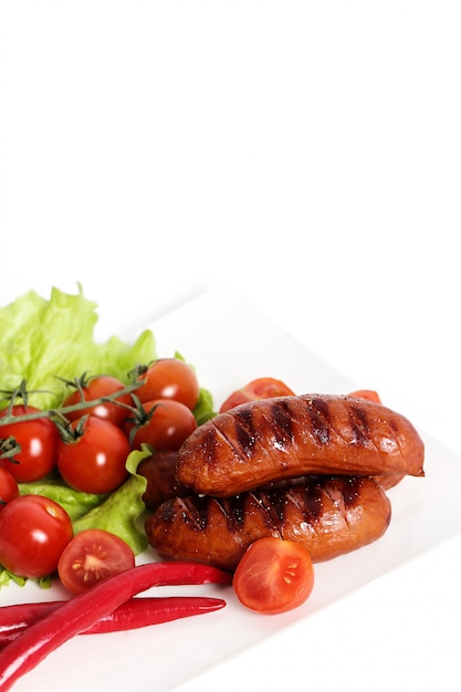 Photo gratuite saucisse grillée