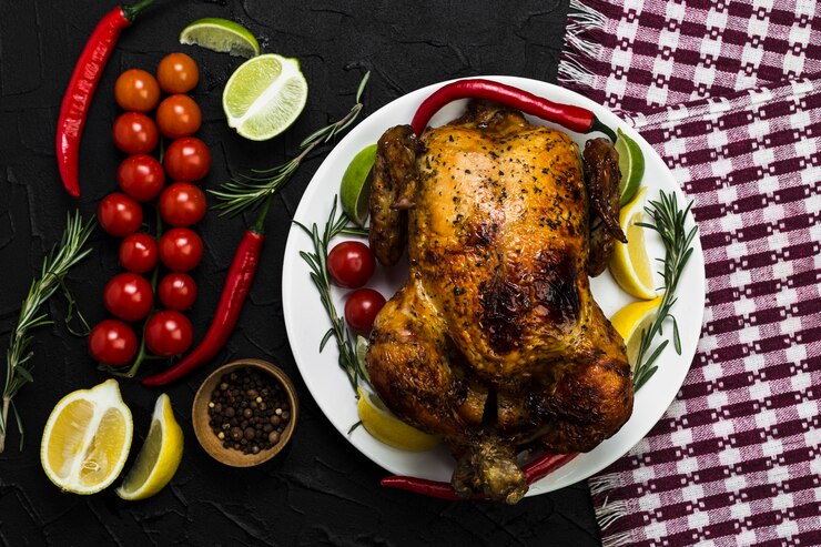 Photo gratuit serviette près de poulet et légumes