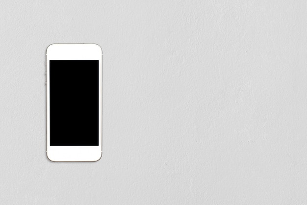 Smartphone maquette vue de dessus modèle avec écran noir sur la table de ciment avec copyspace.