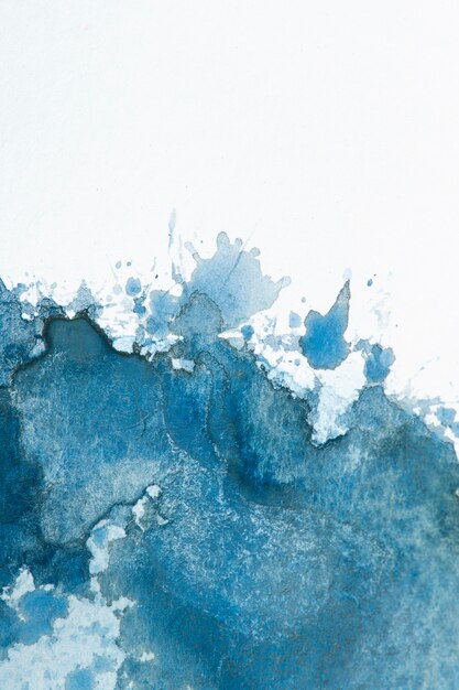 Splash aquarelle sur la texture du papier