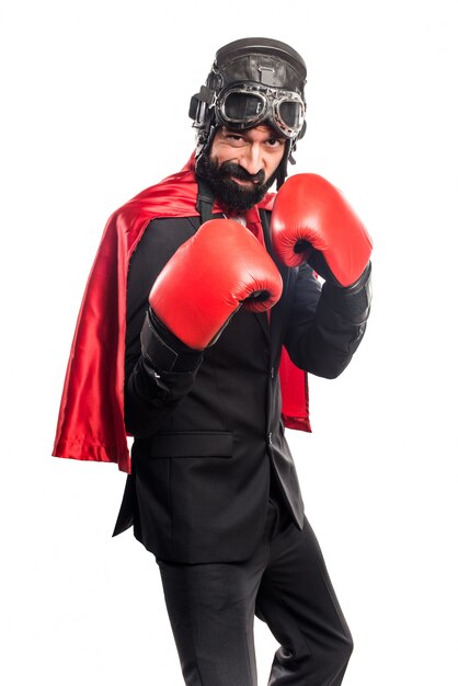 Superhéros d&#39;homme d&#39;affaires avec des gants de boxe