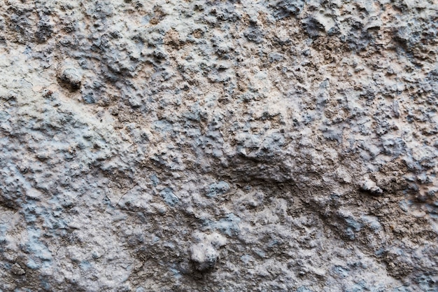 Surface de béton rugueuse et grossière