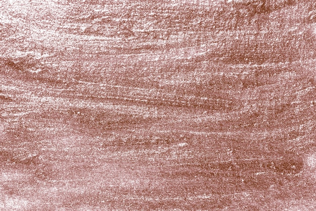 Surface de mur en béton peint à peu près or rose