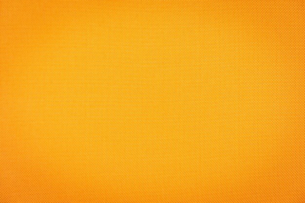 Surface et texture abstraites des textures de tissu de coton orange