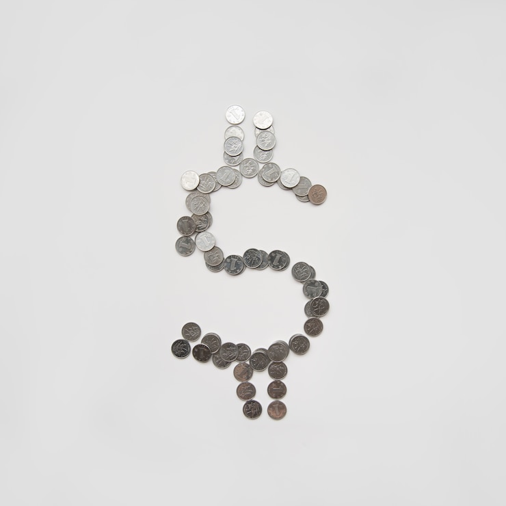 Photo gratuit symbole du dollar fait avec des pièces