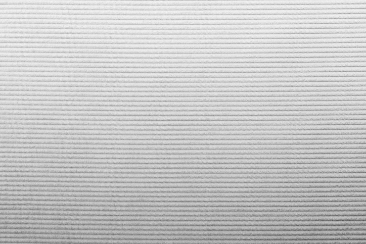 Photo gratuit tapis lisse avec un fond texturé