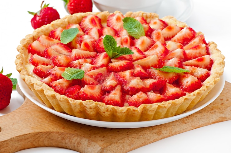 Photo gratuit tarte aux fraises avec crème à la crème