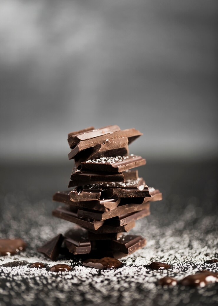Photo gratuit tas de chocolat plein vue de face