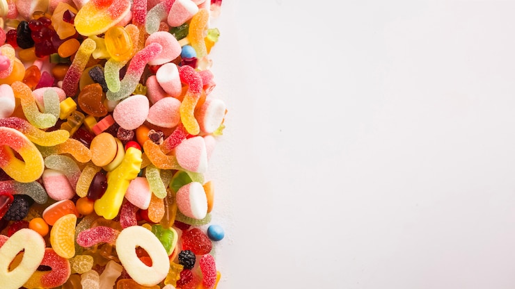 Photo gratuit tas de winegums sur le côté gauche