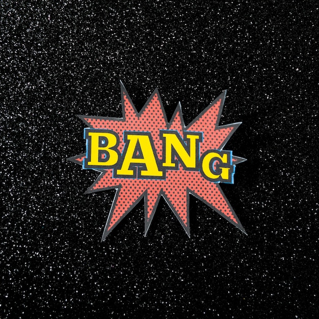 Photo gratuite texte d'explosion bang sur fond noir cosmos