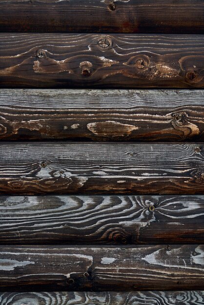 Texture en bois de planches marron foncé.
