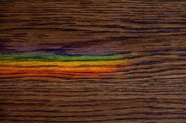 Photo gratuit texture en bois avec taches colorées