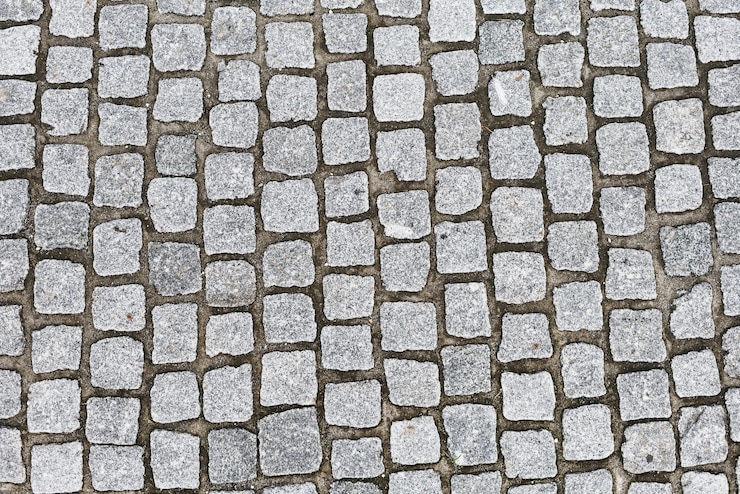 Photo gratuit texture d'une chaussée en granit pavé
