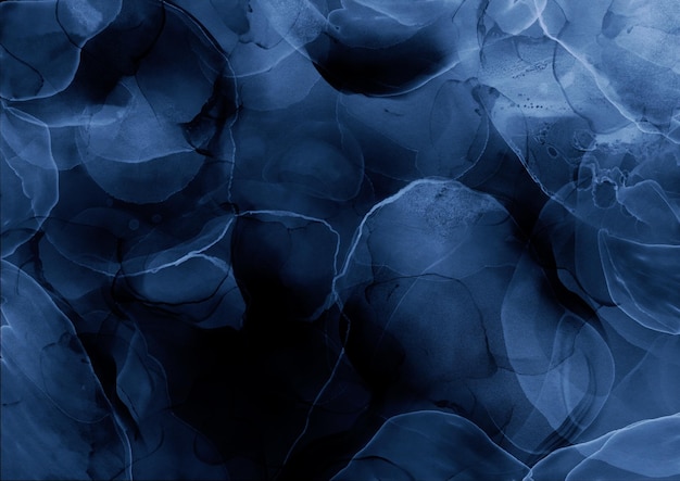 Texture d'encre liquide bleue sur fond noir