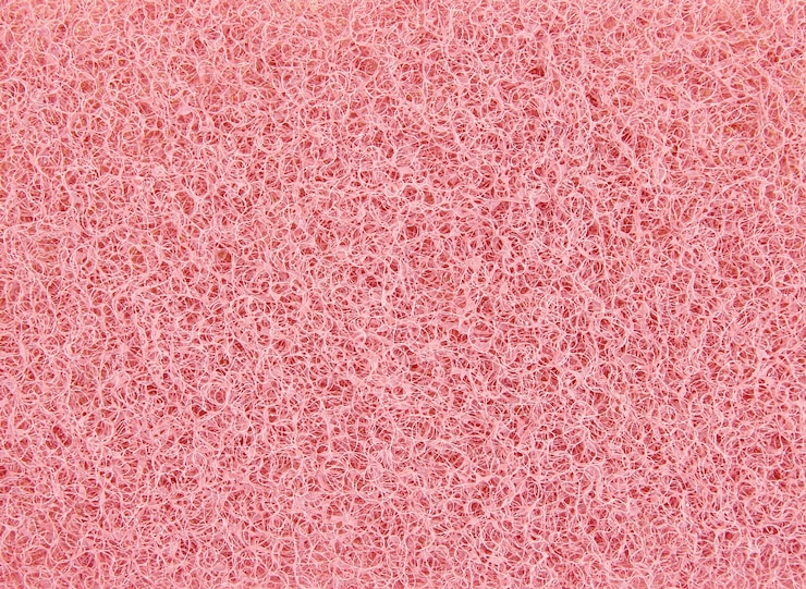 Photo gratuit texture éponge rouge abstraite pour l&#39;arrière plan