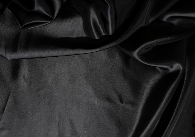 Texture de fond de tissu en soie noire