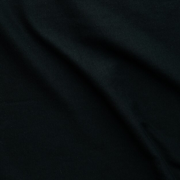 Texture de fond de vagues de tissu - gros plan d'un fond textile