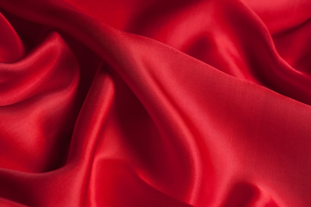 Texture de fond de vagues de tissu rouge