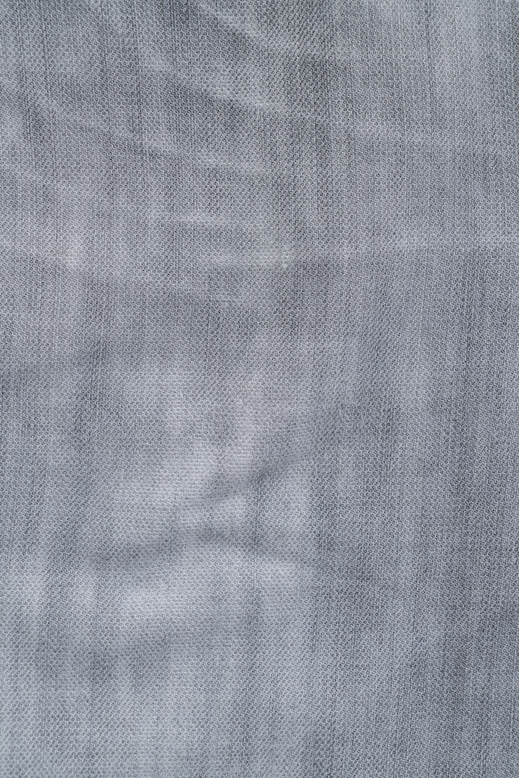 Photo gratuit texture des jeans gris