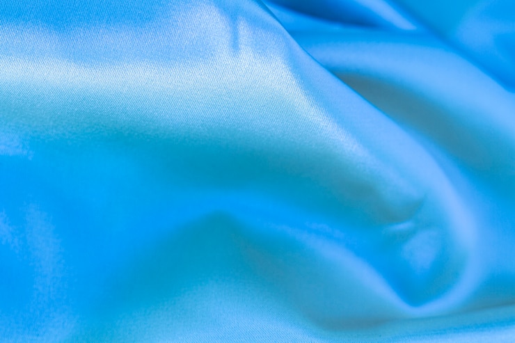 Photo gratuit texture matérielle de tissu bleu avec espace copie