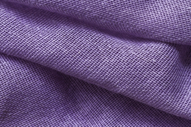 Photo gratuit texture matérielle de tissu violet élégant lisse