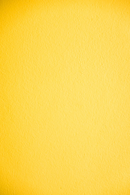 Texture de mur en béton jaune