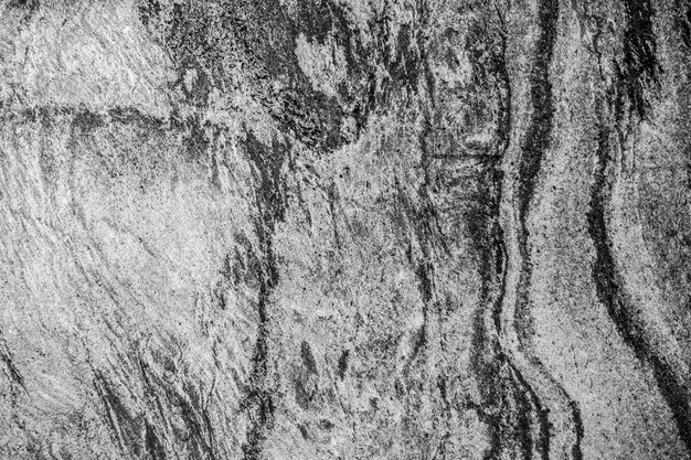Texture de mur en carreaux de pierre noire