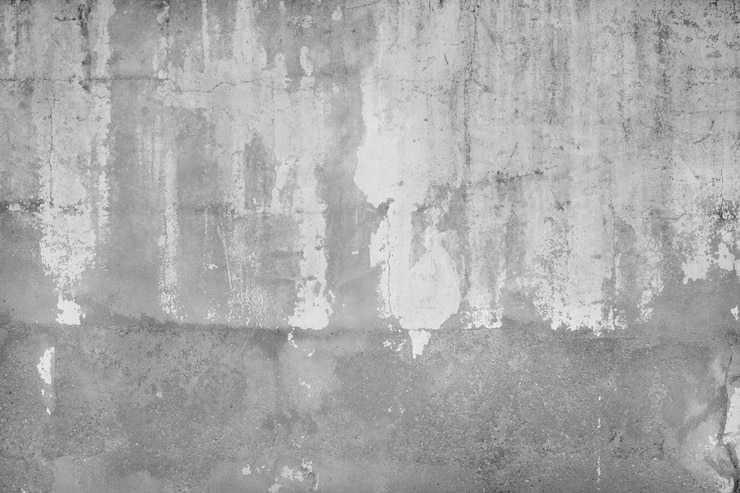 Photo gratuit texture de mur avec des taches blanches