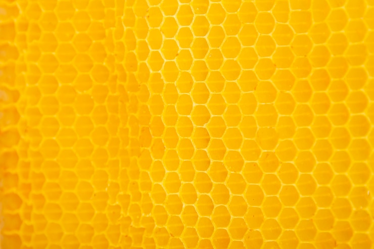 Photo gratuit texture en nid d'abeille jaune