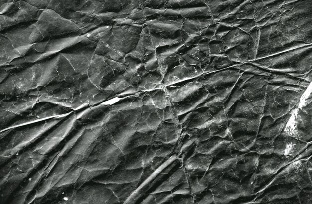 Texture de papier noir froissé