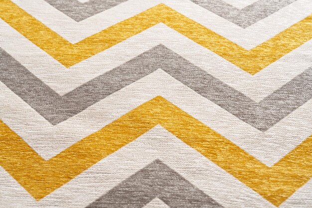 Texture de tissu coloré avec fond imprimé motif géométrique en zigzag
