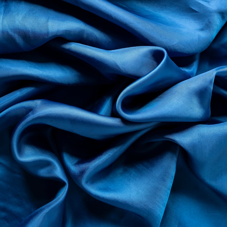 Photo gratuit texture de tissu plat