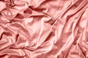 Photo gratuite texture de tissu de soie brillant rose