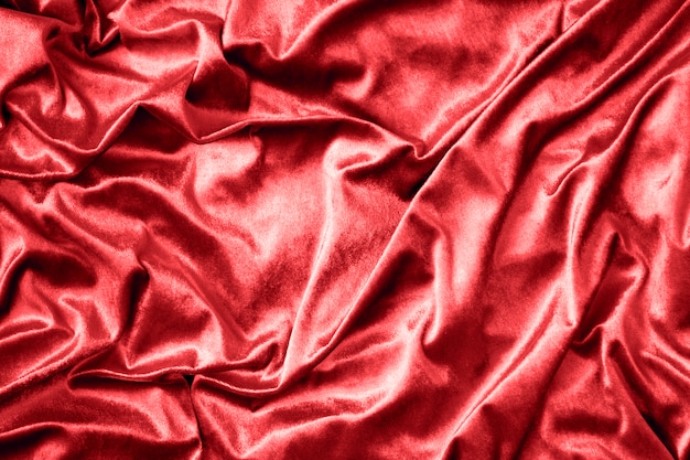 Texture de tissu de soie brillant rouge