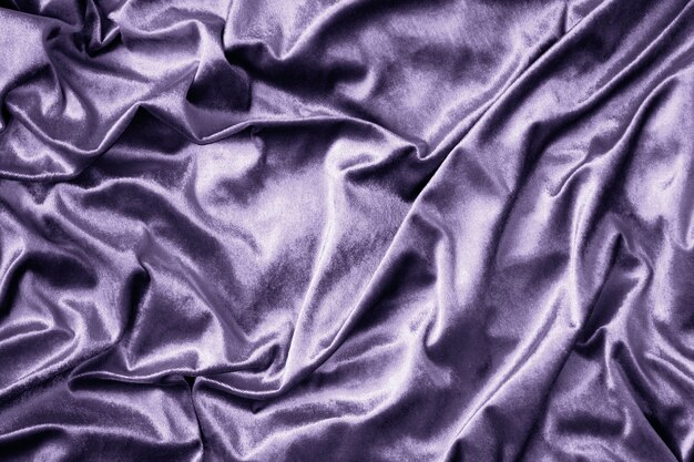 Texture de tissu de soie brillant violet