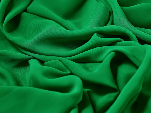 Le tissu abstrait vert, le tissu et la texture, le théâtre de rideau