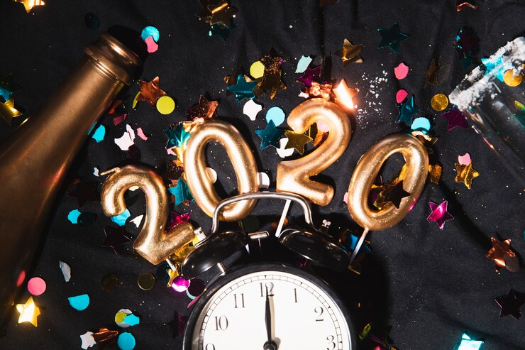 Photo gratuit top view date du nouvel an avec des confettis