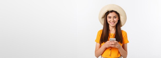 Travel concept close up portrait young beautiful attractive girl with trendy hat and smiling white b