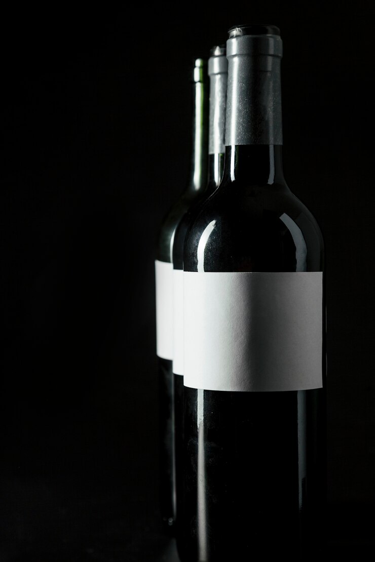 Photo gratuit trois bouteilles de vin