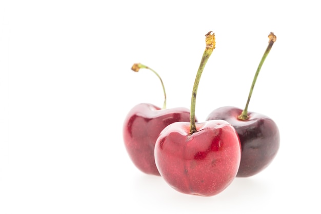 Photo gratuite trois cerises savoureuses