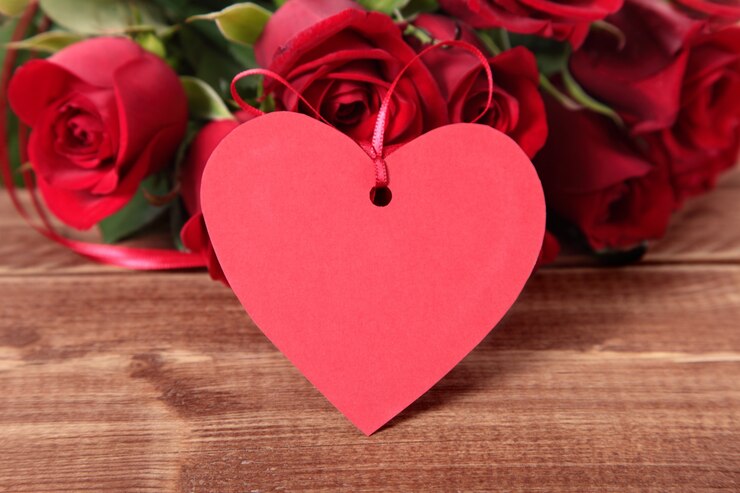 Photo gratuit valentine background d&#39;étiquette de cadeau et des roses